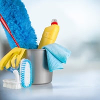 A bucket of cleaning tools.