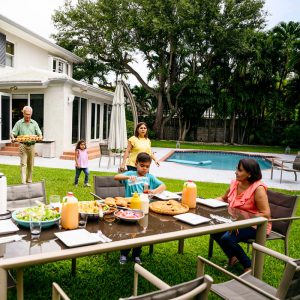 A family eating outside.